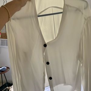 Casual long sleeved white shirt with buttons